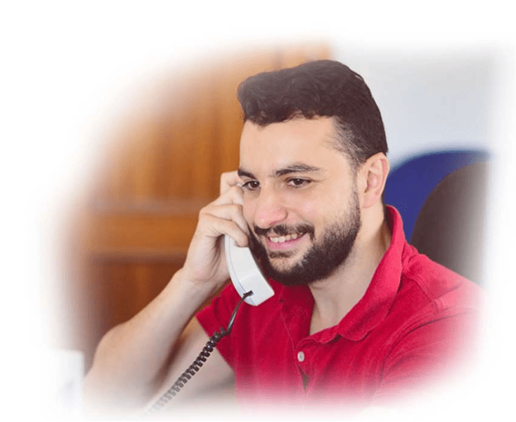 Man on landline phone